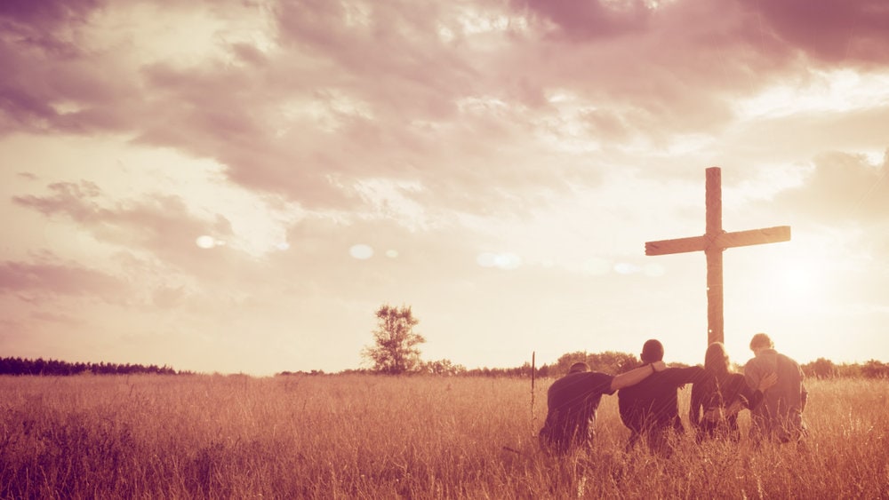 WorshipFieldGroupKneelingCrossHD
